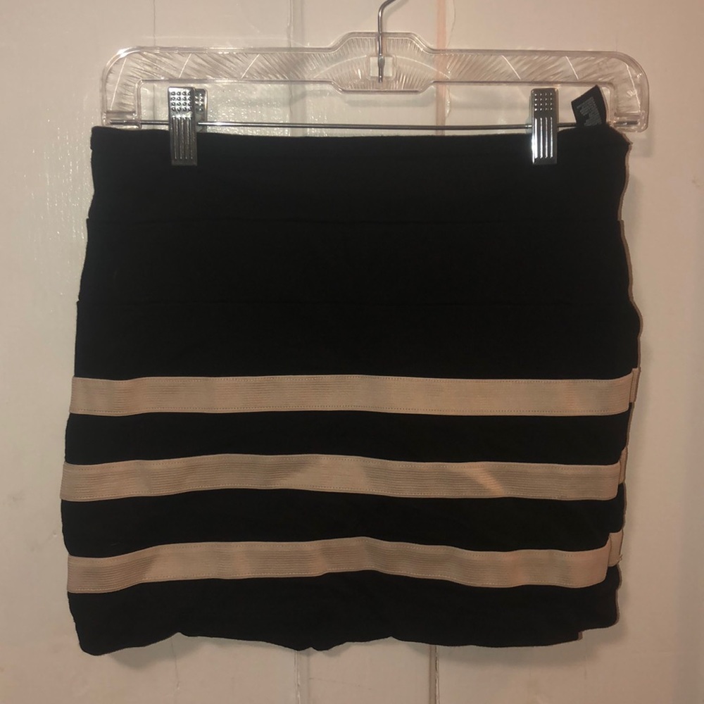 Never worn black and cream mini skirt